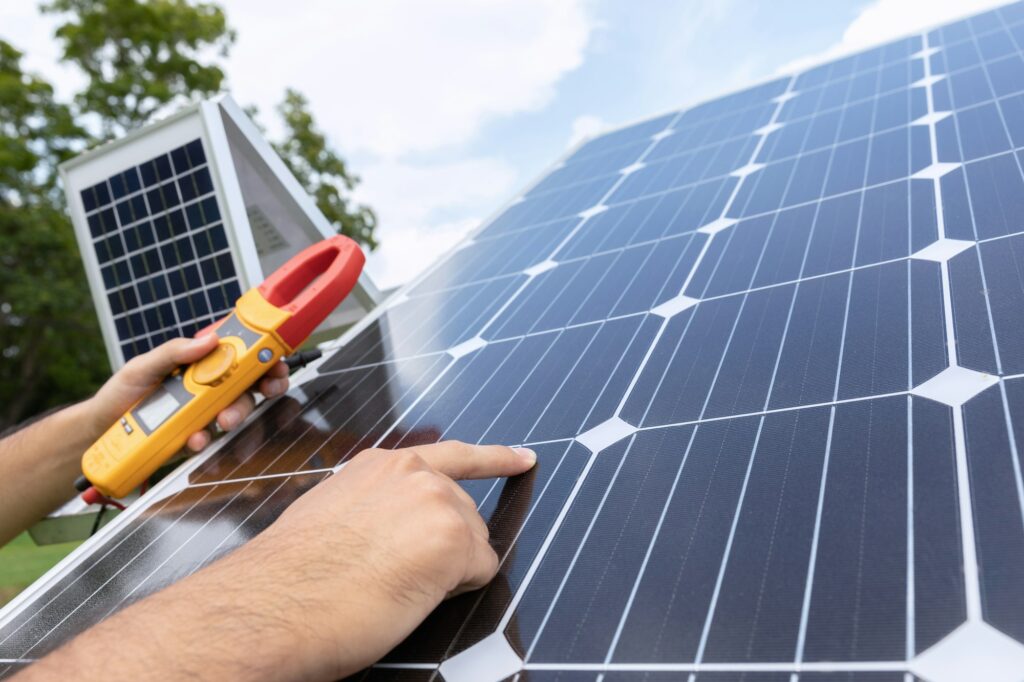 Engineer with energy measurement tool photovoltaic modules for renewable energy